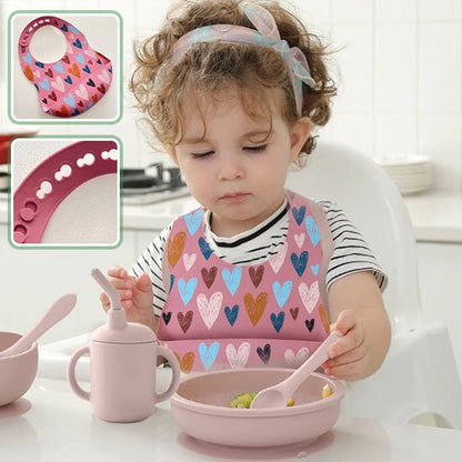Bavoir bébé avec petite cuillère