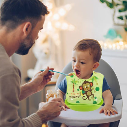 Bavoir bébé qui mange avec son papa